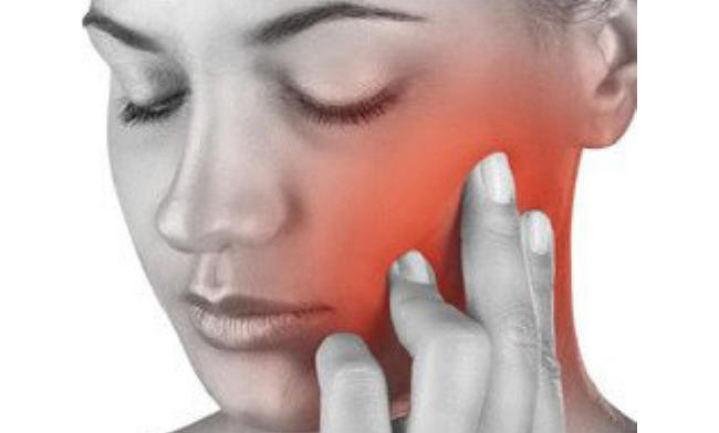 Woman with a painful jaw joint
